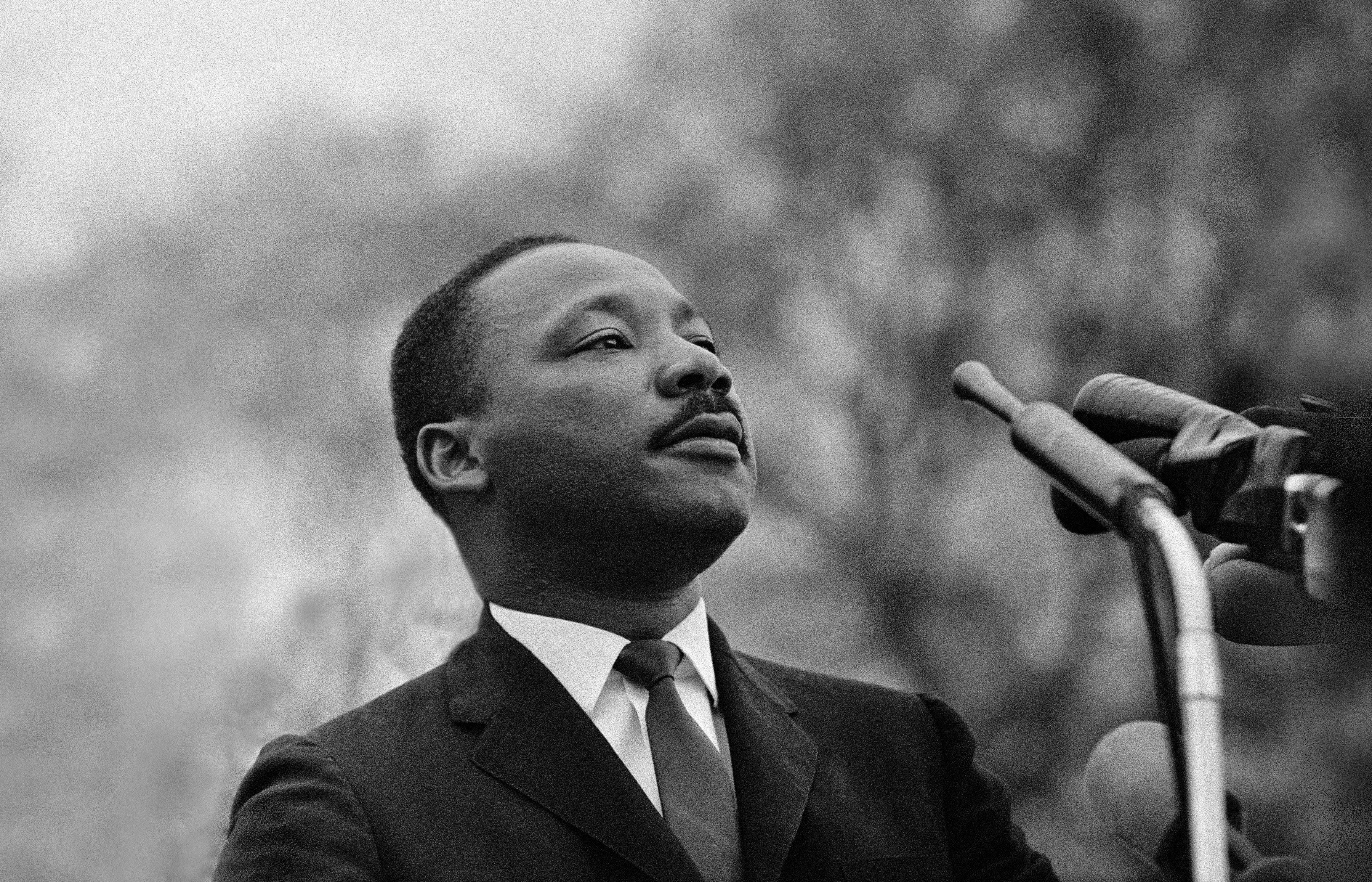 A black and white photo of Martin Luther King Jr. 
