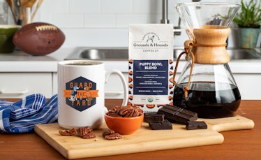 Grounds & Hounds Coffee's Puppy Bowl Blend and merch includes a cute coffee mug.