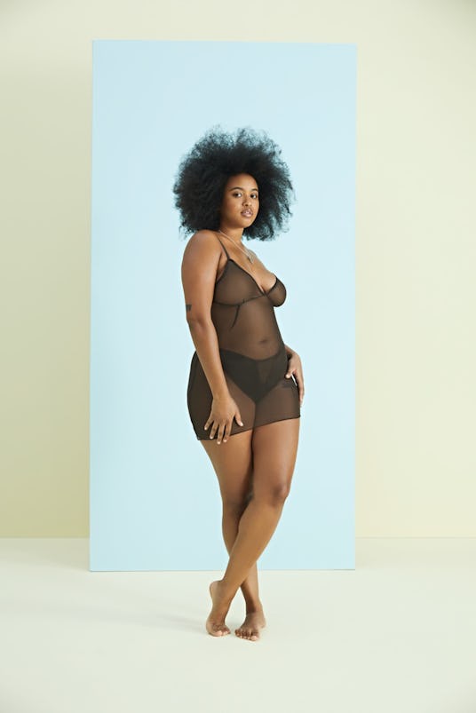 A model wearing the Lasette, transparent black lingerie.