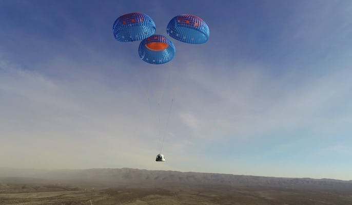 The Blue Origin NS-14 capsule landing, aided by a parachute.