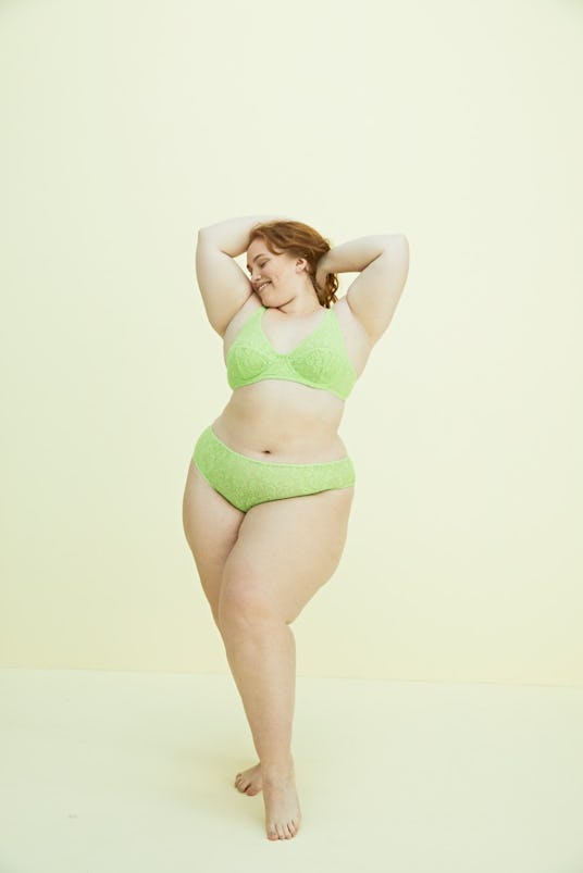 A model wearing an Araks set, a light green lingerie.