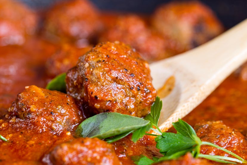 Cooked and prepared meatballs in a small pot