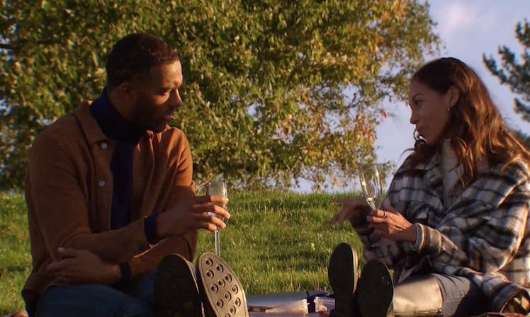 'The Bachelor's Matt James and Serena chat while holding champagne glasses and enjoy a charcuterie b...