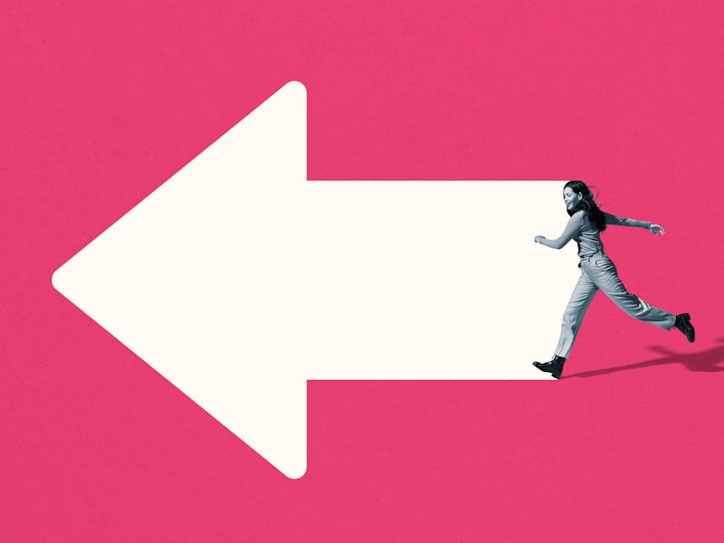 Happy young woman running on white arrow - stock photo