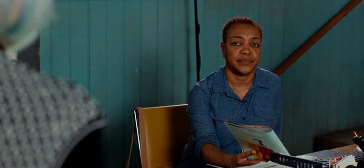 Ronnie from 'Schitt's Creek' gives another character an unimpressed look.