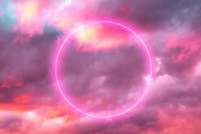 Futuristic neon circle in the burning sky with stunning pink colors