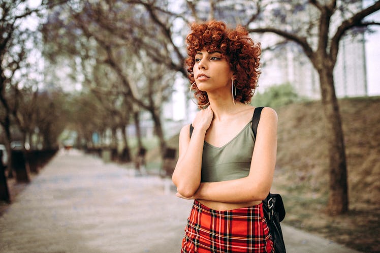 Hispanic Redhead woman