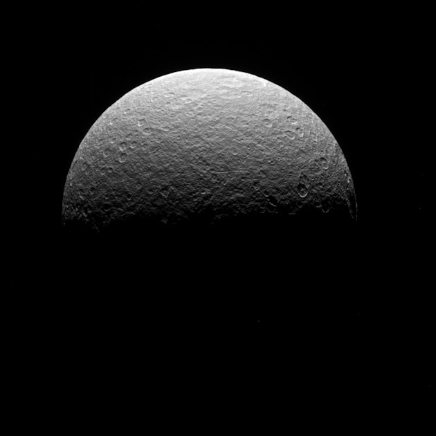 Saturn’s moon Rhea has a mysterious material on its surface