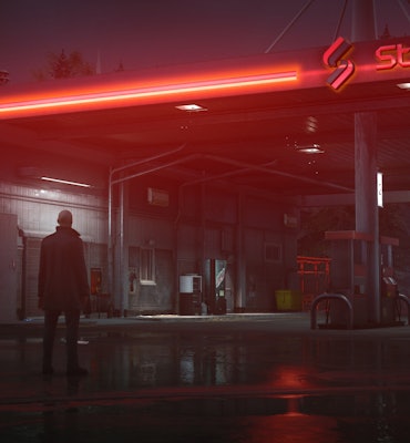 A screenshot from the game Hitman 3 with Agent 47 outside of a gas station.