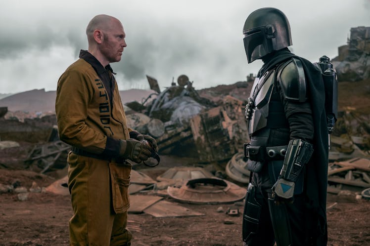 Two characters having a conversation in the Mandalorian Season 3