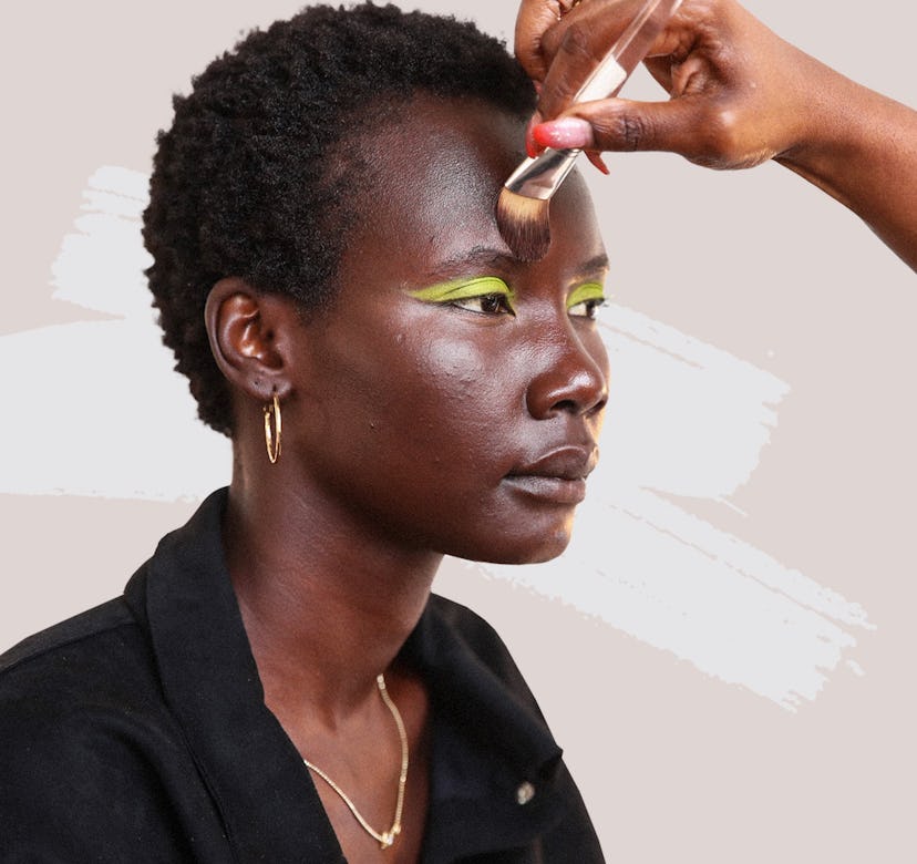 female getting her makeup done