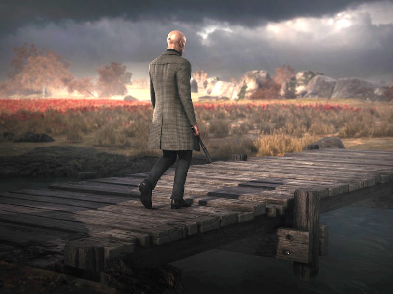 Agent 47 from Hitman 3 looking into the distance