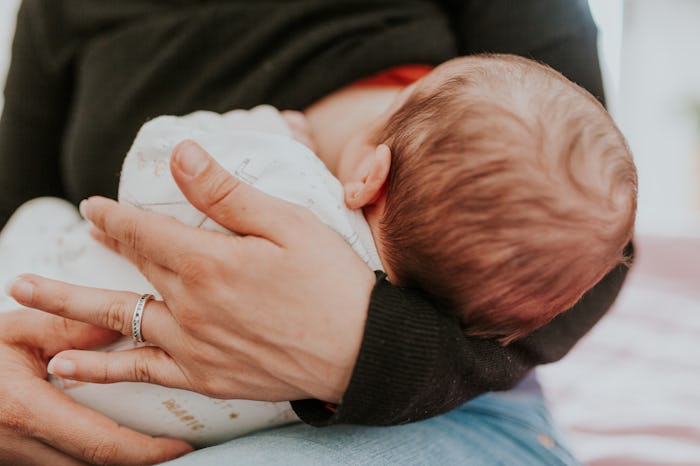 You should continue breastfeeding, even with a clogged milk duct.