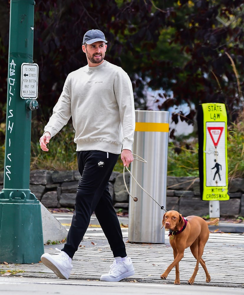 Kevin Love walks his dog.