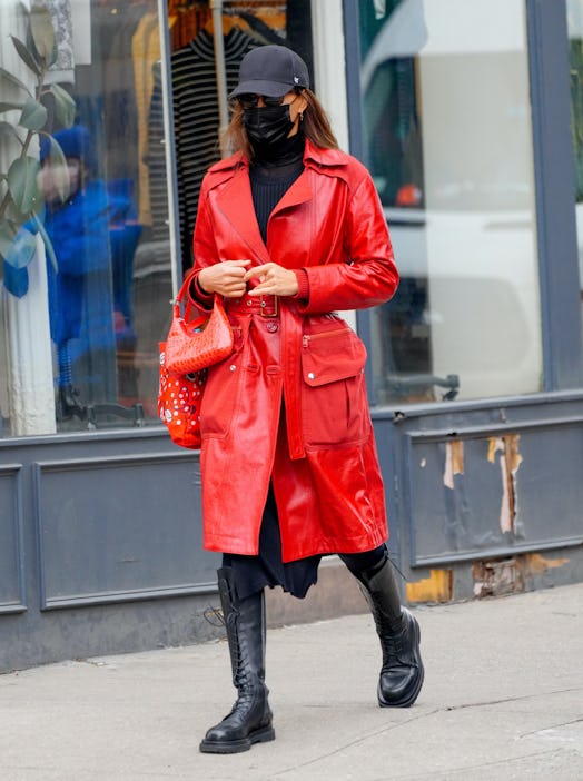 Irina Shayk in a red leather coat from Coach while walking in New York City on Jan. 27.