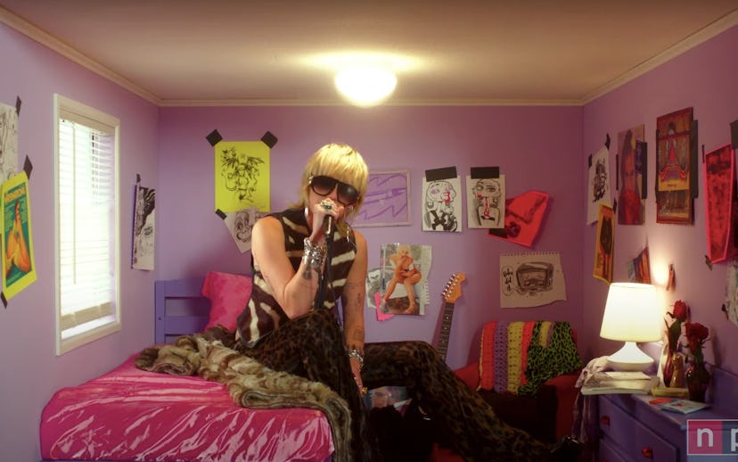 Miley Cyrus performed in a miniature-sized bedroom for her at-home performance for NPR's Tiny Desk C...