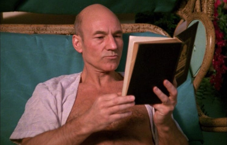 Renaissance man Jean-Luc Picard enjoys a book during a rare moment away from the bridge.