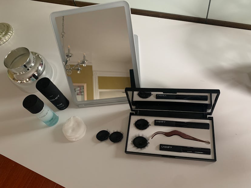 Lashify's Intimate Lash collection contents spread out on a table. 