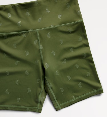 Chipotle's activewear line with bike shorts and leggings includes green and black shades.