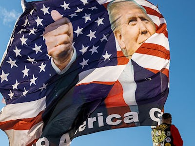 A flag with the face of President Donald Trump