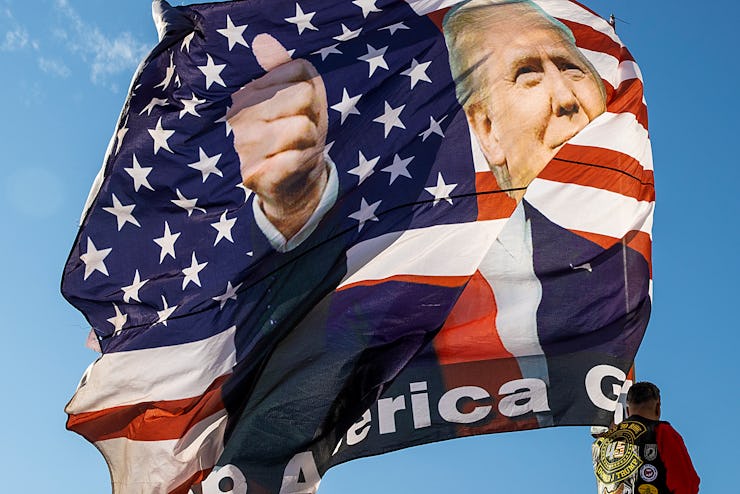 A flag with the face of President Donald Trump