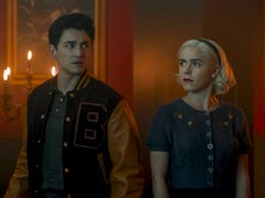 Sabrina and Nick from the 'Chilling Adventures of Sabrina' on Netflix stand together. 