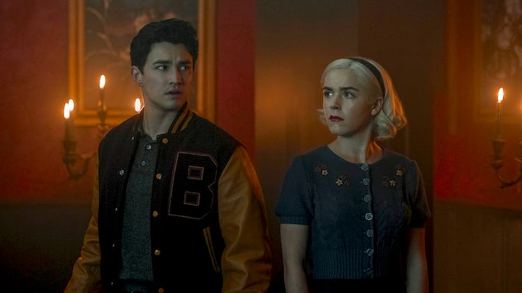Sabrina and Nick from the 'Chilling Adventures of Sabrina' on Netflix stand together.