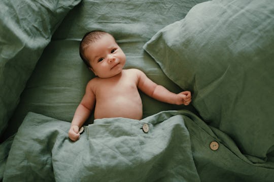 baby lying in the bed