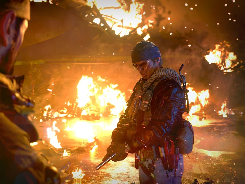 Two characters with guns and fire behind them in Call of Duty: Black Ops Cold War League Play mode
