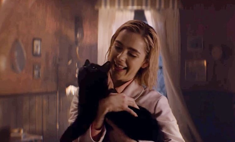 Kiernan Shipka is allergic to cats, even though Sabrina cuddles with Salem.