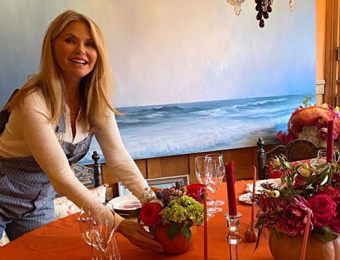 Christie Brinkley's dining room features the mismatched dining chair trend