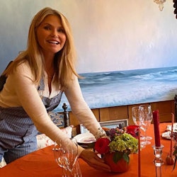 Christie Brinkley's dining room features the mismatched dining chair trend