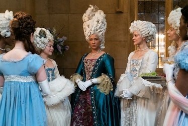 Queen Charlotte with her ladies-in-waiting at a party in episode eight of "Bridgerton.°