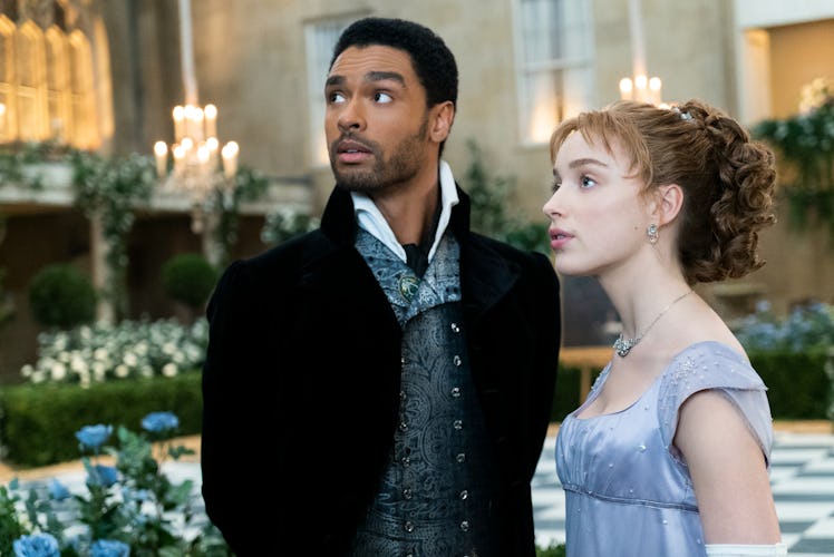 REGÉ-JEAN PAGE as SIMON BASSET and PHOEBE DYNEVOR as DAPHNE BRIDGERTON.