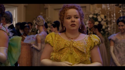 Penelope Featherington in a yellow, butterfly dress in episode one of "Bridgerton."