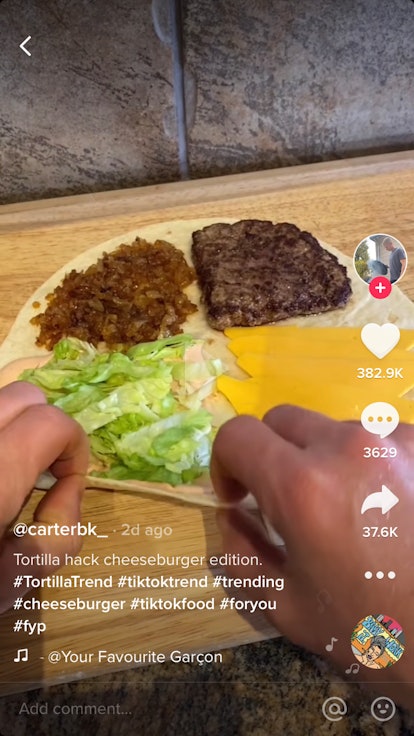 @carterbk_ on TikTok makes a cheeseburger tortilla with onions and lettuce.