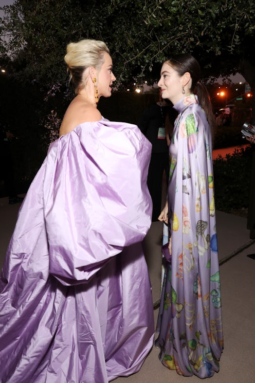  Katy Perry and Lorde wearing lilac statement dresses