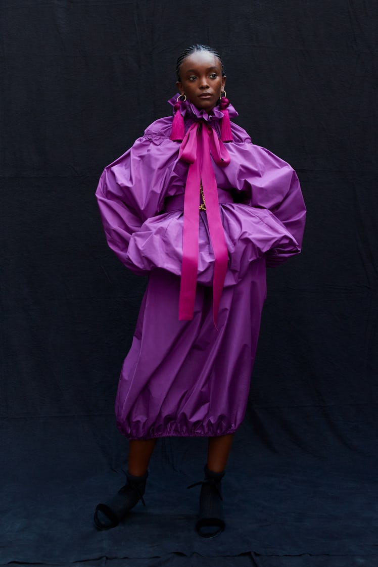 Model wearing a purple Patou spring 2022 collection dress
