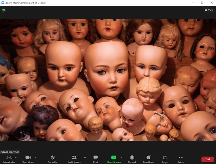 These scary Zoom backgrounds include creepy doll heads.