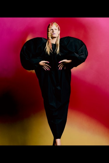 A model in a black Dries Van Noten dress