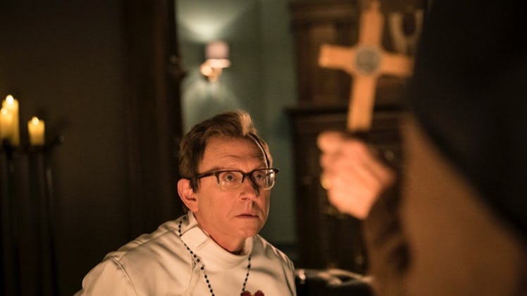 Leland in Evil season 2 at church dressed as a priest 