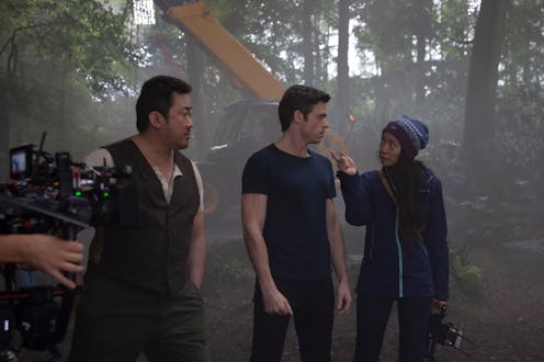 Don Lee, Richard Madden and director Chloé Zhao behind the scenes of Marvel Studios' 'Eternals.'