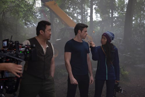 Don Lee, Richard Madden and director Chloé Zhao behind the scenes of Marvel Studios' 'Eternals.'