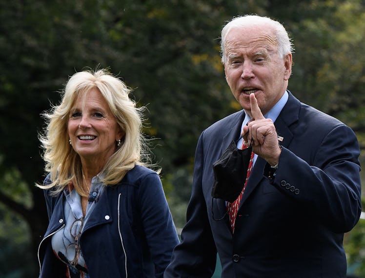 Dr. Jill and President Joe Biden, walking.
