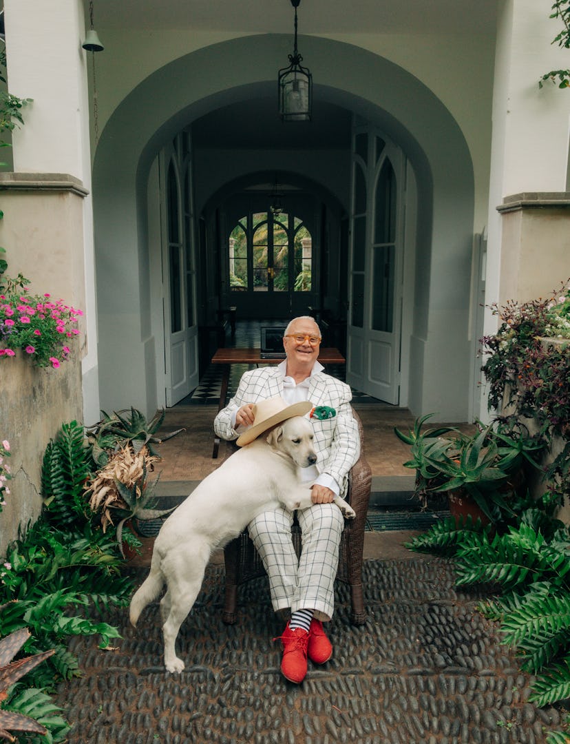 Manolo Blahnik wears his own clothing and accessories.