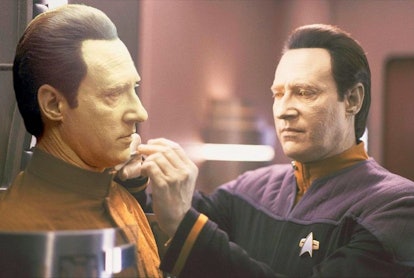 Lieutenant Commander Data (Brent Spiner) performs diagnostic maintenance on his android predecessor B4, in Star Trek: Nemesis