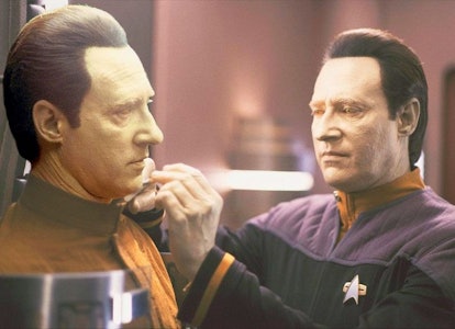 Lieutenant Commander Data (Brent Spiner) performs diagnostic maintenance on his android predecessor B4, in Star Trek: Nemesis