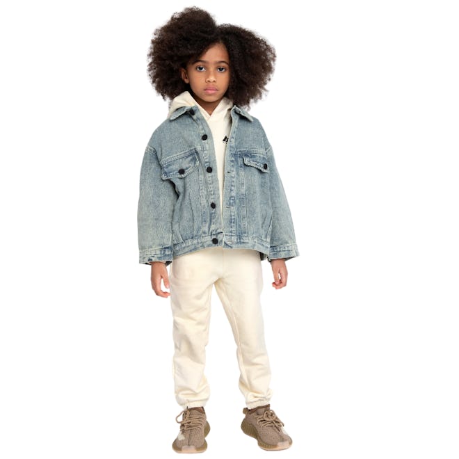 Kid modeling denim jacket