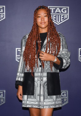 Naomi Osaka in red passion twists at Tag Heuer event