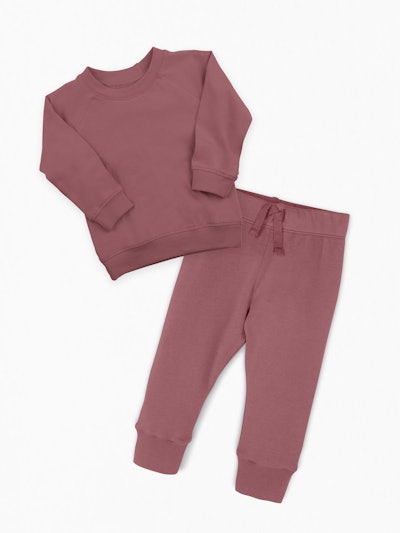 Flat lay of burgundy set; sweatshirt and sweatpants 